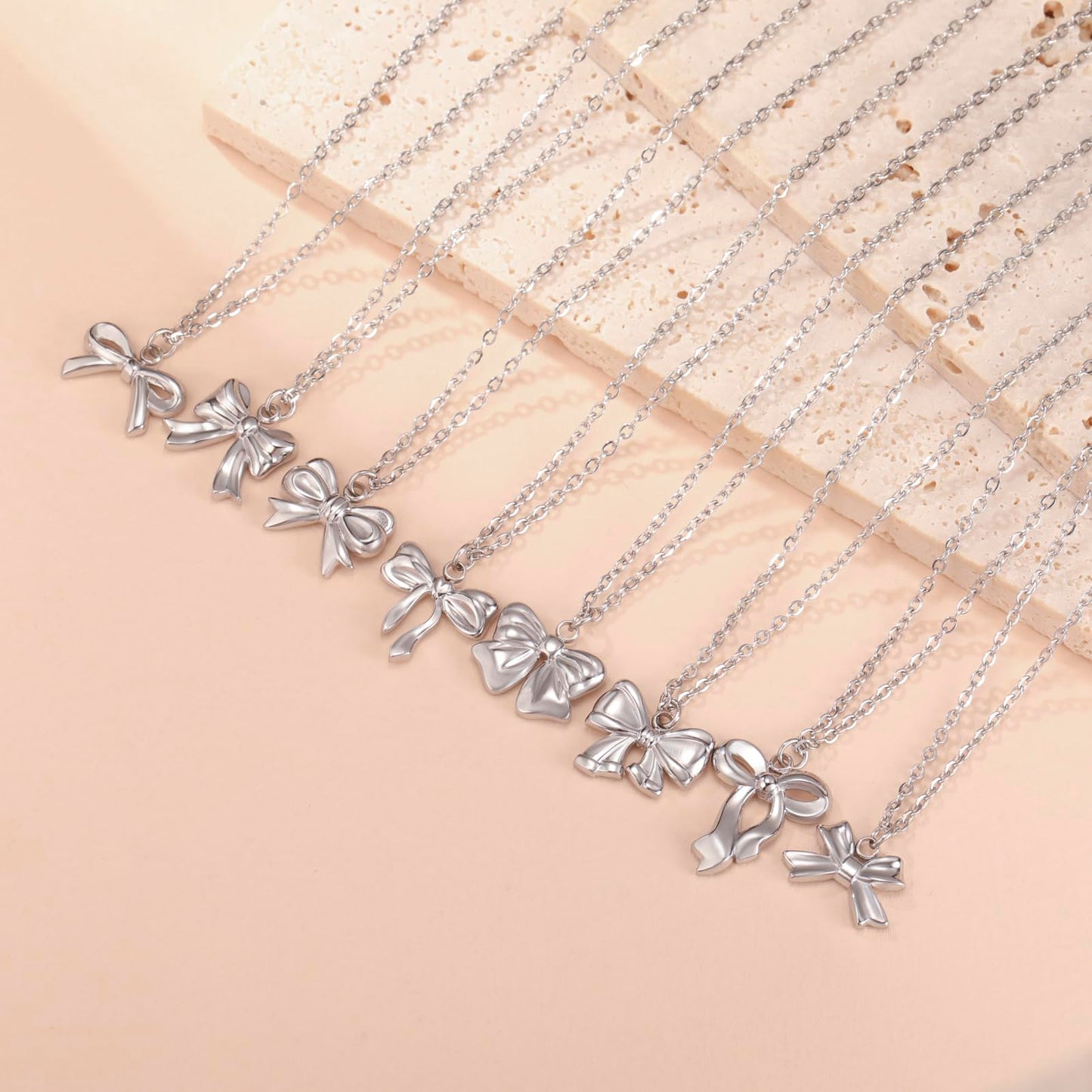 kkjoy Cute Small Tiny Bow Necklace Stainless Steel Silver Plated Dainty Ribbon Bow Tie Pendant Necklace Butterfly Bowknot Jewelry for Women Charming Ladies (Style 2, Silver)
